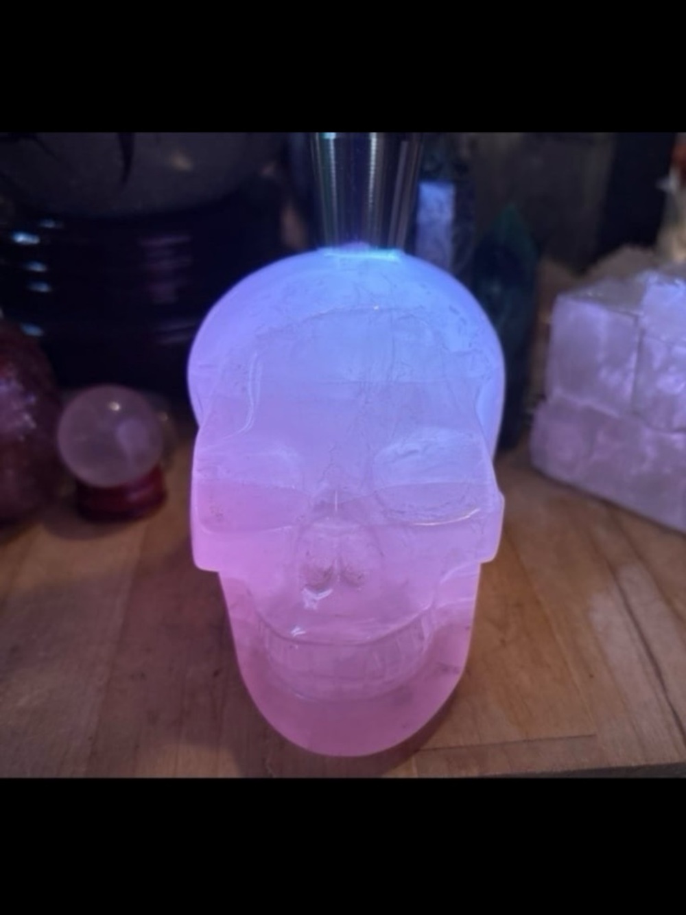 Rose quartz skull with star light
